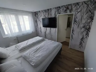 Ein Bett oder Betten in einem Zimmer der Unterkunft Apartment Feldkirch