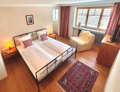 Ein Bett oder Betten in einem Zimmer der Unterkunft Haus Wallis by stayFritz - Ski-In Ski-Out Apartments am Arlberg
