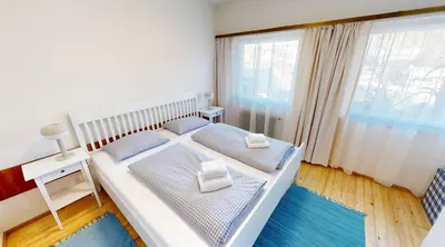 Ein Bett oder Betten in einem Zimmer der Unterkunft Ninis - Ferienhaus im Bregenzerwald