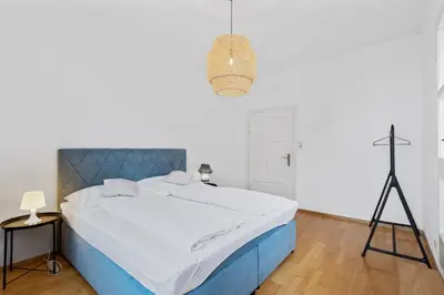 Ein Bett oder Betten in einem Zimmer der Unterkunft Villa Seeblick 1908