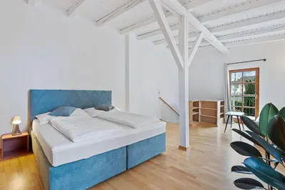 Ein Bett oder Betten in einem Zimmer der Unterkunft Villa Seeblick 1908