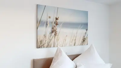 Ein Bett oder Betten in einem Zimmer der Unterkunft CROWN LIVING Design Apartment Dornbirn - zentral Gelegen, WLAN, kostenlosem Parkplatz und Self Check-in, ideal für Geschäftsreisende und Feriengäste