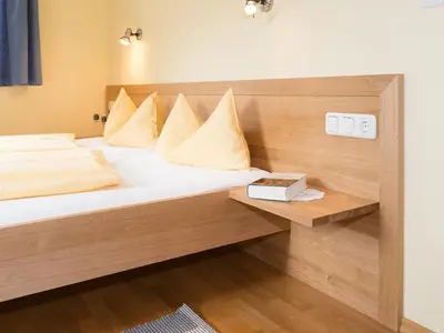 Ein Bett oder Betten in einem Zimmer der Unterkunft Appartements Moosbrugger Haus Herlinde