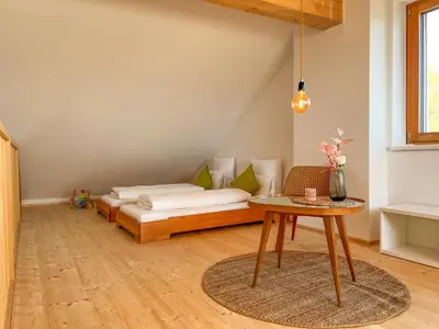 Ein Bett oder Betten in einem Zimmer der Unterkunft Gamsfels Balbina Galeriewohnung