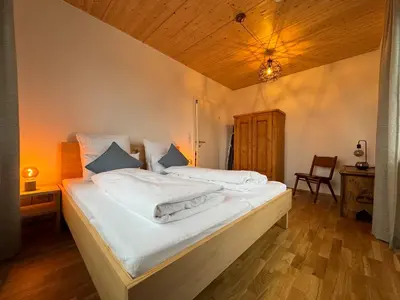 Ein Bett oder Betten in einem Zimmer der Unterkunft Gamsfels Balbina Galeriewohnung