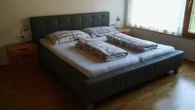 Ein Bett oder Betten in einem Zimmer der Unterkunft Studio Bergblick