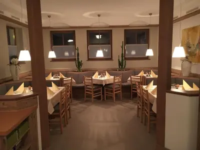 Ein Restaurant oder anderes Speiselokal in der Unterkunft Gästehaus Brugger