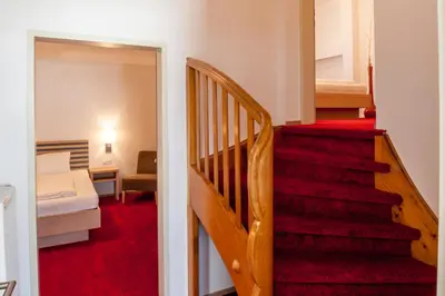 Ein Bett oder Betten in einem Zimmer der Unterkunft Gästehaus Brugger
