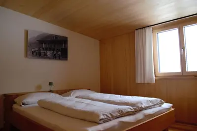 Ein Bett oder Betten in einem Zimmer der Unterkunft Ferienwohnung Mian