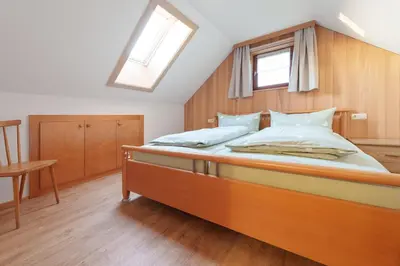 Ein Bett oder Betten in einem Zimmer der Unterkunft Ferienwohnung Raid
