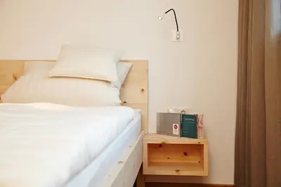 Ein Bett oder Betten in einem Zimmer der Unterkunft Chalet Apartment Oswalda-Hus