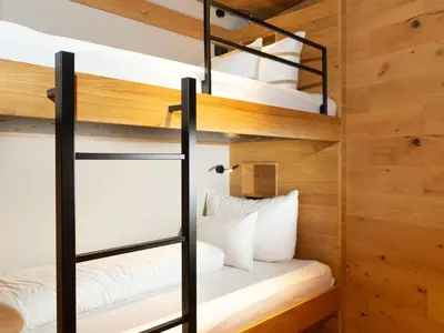 Ein Bett oder Betten in einem Zimmer der Unterkunft Wohnung in Schröcken bei Ski Arlberg