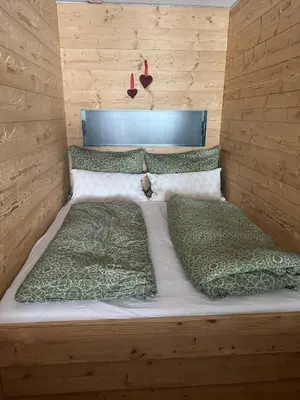 Ein Bett oder Betten in einem Zimmer der Unterkunft TOP 40 Haus Sonnalp