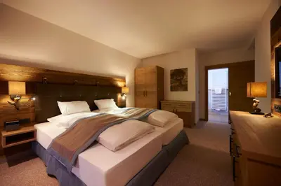 Ein Bett oder Betten in einem Zimmer der Unterkunft Boutique Hotel Herzhof - Garni-Appartements - Adults Only