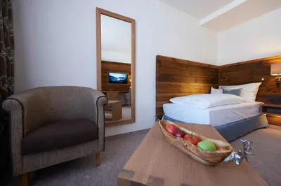 Ein Bett oder Betten in einem Zimmer der Unterkunft Boutique Hotel Herzhof - Garni-Appartements - Adults Only