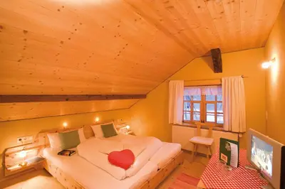 Ein Bett oder Betten in einem Zimmer der Unterkunft Naze`s Hus Mellau