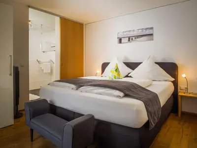 Ein Bett oder Betten in einem Zimmer der Unterkunft in the holiday home Sandra Comfortable holiday residence