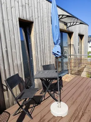 Ein Balkon oder eine Terrasse in der Unterkunft Little Tiny Village Haus 4