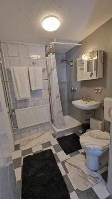 Ein Badezimmer in der Unterkunft homy Bludenz Downtown Suites