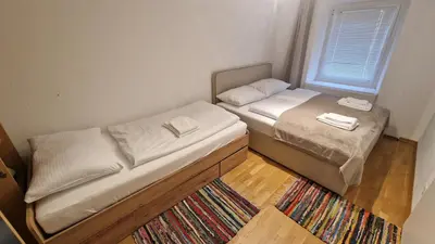 Ein Bett oder Betten in einem Zimmer der Unterkunft homy Bludenz Downtown Suites