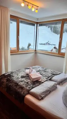 Ein Bett oder Betten in einem Zimmer der Unterkunft Adventure Panorama 