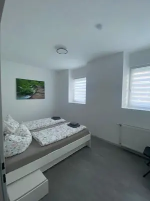 Ein Bett oder Betten in einem Zimmer der Unterkunft Mia Apartment