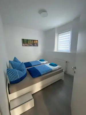Ein Bett oder Betten in einem Zimmer der Unterkunft Mia Apartment