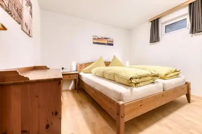 Ein Bett oder Betten in einem Zimmer der Unterkunft Chalet Tschengla