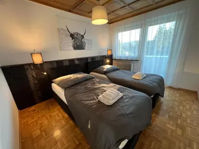 Ein Bett oder Betten in einem Zimmer der Unterkunft rs44 Apartments über den Dächern von Bregenz