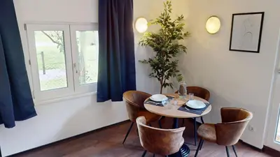 Grundriss der Unterkunft CROWN LIVING Design Loft Lustenau - Loft mit Küche, Bibliothek und Gartensitzplatz, grenznah gelegen