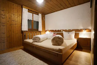Ein Bett oder Betten in einem Zimmer der Unterkunft Apartment Jaegerhaus
