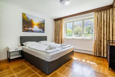 Ein Bett oder Betten in einem Zimmer der Unterkunft homy MontaVista - 300m zur Golmerbahn