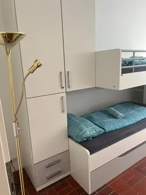 Ein Bett oder Betten in einem Zimmer der Unterkunft Seeblick Bodensee 6, free Parking, free Internet, 24 h Checkin