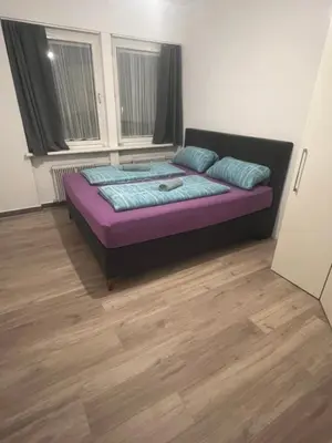 Ein Bett oder Betten in einem Zimmer der Unterkunft Seeblick Bodensee 6, free Parking, free Internet, 24 h Checkin