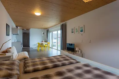 Ein Bett oder Betten in einem Zimmer der Unterkunft FLEXhome your central, calm and cosy place in Dornbirn