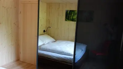 Ein Bett oder Betten in einem Zimmer der Unterkunft Erwins Ferien Paradies