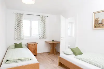 Ein Bett oder Betten in einem Zimmer der Unterkunft Zum Hirsch