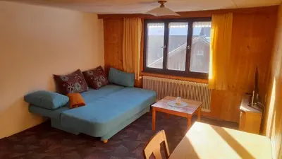 Ein Sitzbereich in der Unterkunft Ferienhaus Bär