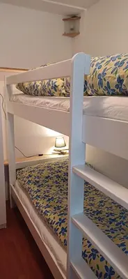 Ein Bett oder Betten in einem Zimmer der Unterkunft Familienfreundliche Wohnung Bregenz, Österreich