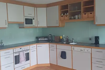 Küche/Küchenzeile in der Unterkunft Familienfreundliche Wohnung Bregenz, Österreich