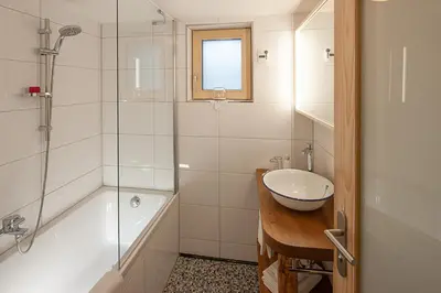 Ein Badezimmer in der Unterkunft Alps Hoamat Ferienchalet