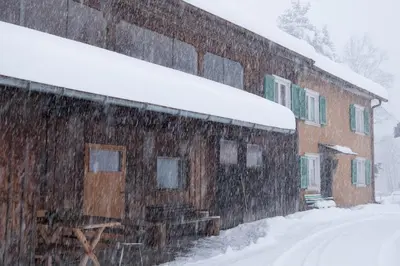Alps Hoamat Ferienchalet im Winter
