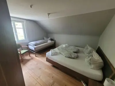 Ein Bett oder Betten in einem Zimmer der Unterkunft Lakeview Apartment Bregenz Bodensee