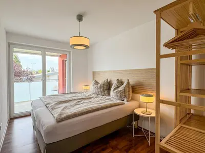 Ein Bett oder Betten in einem Zimmer der Unterkunft Ferienwohnung 