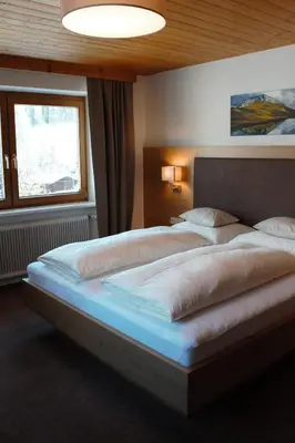 Ein Bett oder Betten in einem Zimmer der Unterkunft Haus Biberkopf