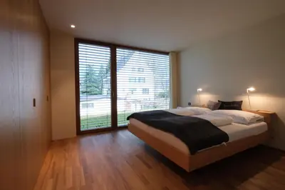 Ein Bett oder Betten in einem Zimmer der Unterkunft Ferienhaus S11 Lustenau