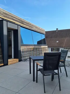 Ein Balkon oder eine Terrasse in der Unterkunft Ferienhäuschen Wolfurt