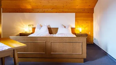 Ein Bett oder Betten in einem Zimmer der Unterkunft Pension Egg'spresso