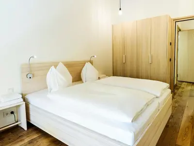 Ein Bett oder Betten in einem Zimmer der Unterkunft alpen select apartments Kleinwalsertal