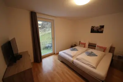 Ein Bett oder Betten in einem Zimmer der Unterkunft Monika-Mellau Appartements